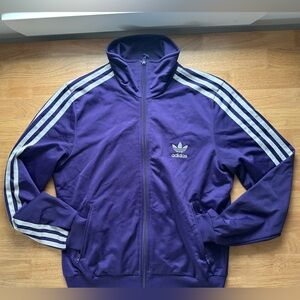 Adidas Women’s Purple Track Jacket with Signature Three Stripes